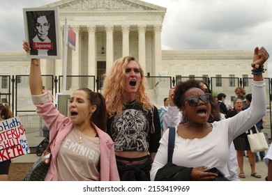 WASHINGTON, DC - May 5, 2022: Pro-choice demonstrators chant and hold signs in front of the U.S. Supreme Court.