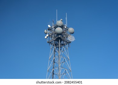 Washington, D.C. - Nov. 23, 2021: This Communication Tower On Top Of The ABC News Building Features Commscope Parabolic Microwave Antennas With Molded Gray Radome With A Red Flash Logo.