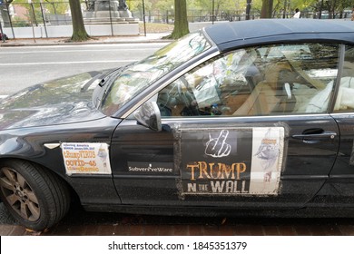 Washington, DC – November 1, 2020: An Anti-Trump Activists Car With Signs Referring To Covid-19 As Covid-45 And A Trumpdemic Along With Objection To His Border Wall Construction Plans.