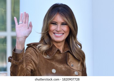 WASHINGTON, DC - NOVEMBER 26, 2019: First Lady Melania Trump smiles and waves to the crowd at the end of the Thanksgiving Turkey Pardon ceremony in Rose Garden of the White House.