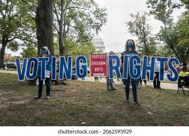 WASHINGTON, DC – OCT. 23, 2021: Protesting recent anti-voter legislation across the country, demonstrators at the Freedom to Vote rally call to pressure congress to pass three voting rights acts.