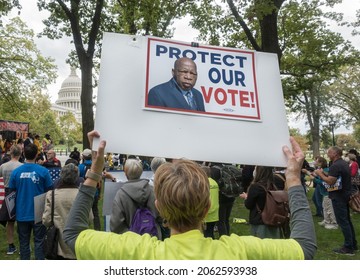 WASHINGTON, DC – OCT. 23, 2021: Protesting recent anti-voter legislation across the country, demonstrators at the Freedom to Vote rally call to pressure congress to pass three voting rights acts.