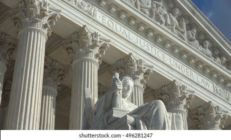 WASHINGTON, DC - OCT 3, 2016:   Equal Justice Under Law Engraving Above Entrance To US Supreme Court Building.  Supreme Court Faces The US Capitol Building.