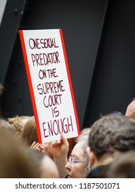 WASHINGTON, DC - SEPTEMBER 24, 2018: An Activist In DC Holds A Protest Sign That Says 