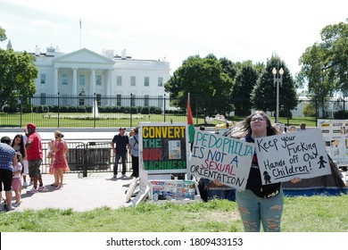 Washington, DC – September 5, 2020: Supporters of the “Pizzagate” QAnon conspiracy theory in Lafayette Park on a quest to inform the public about the truth involved in the debunked plot.