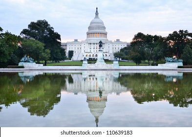 Washington DC, United States Capitol Building With Mirror Reflection In Sunrise