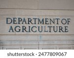 Washington, D.C. - United States - June 18, 2024: Exterior of Building of Department of Agriculture and a metallic writing that says Department of Agriculture on stones