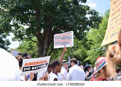 Washington D.C. / United States - June 30, 2018: Families Belong Together March. Protestor Holding A Justice Sign.