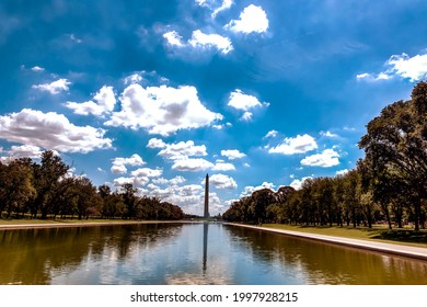 Washington DC, United States-June 24, 2021: US Capital Building And Washington Monument At The End Of The Reflecting Pool, In Washington D.C.                               