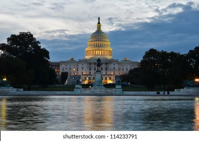 Washington DC, US Capitol Building In A Cloudy Sunrise