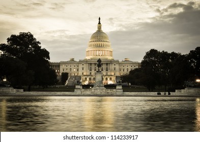 Washington DC, US Capitol Building In A Cloudy Sunrise