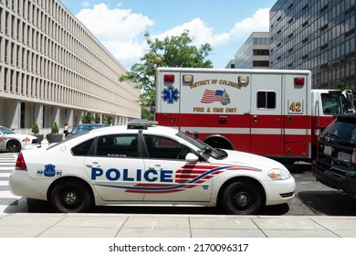 Washington, DC US - June 16, 2022: Metro Police Squad Patrol Car And Fire EMS Ambulance Unit Parked Along Closed Streets During Weekend Juneteenth Celebration