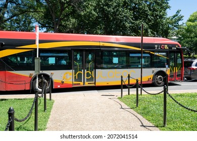 Washington, DC US - June 23, 2021: Circulator Free Transport Bus Waiting At Stop Along Street For Passengers Required To Wear Mask When Riding City Funded Public Transit 