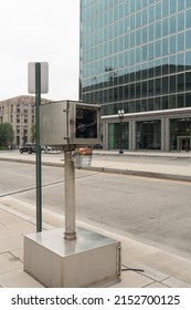Washington, DC US - May 3, 2022: District of Columbia traffic camera box on the side of Massachusetts Avenue that has been defaced, with a Zee symbol, marked on the exterior camera lens