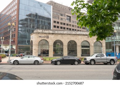 Washington, DC US - May 3, 2022: Former Suntrust bank branch depository location inside historic stone building w large arched windows, now Truist Bank from merger w BBnT now based in Charlotte, NC