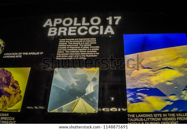 Washington DC, USA; 05 24 2014: A\
sample of a Breccia rock from the surface of the Moon by the Apollo\
17 mission exhibited at the Smithsonian Air and Space\
Museum.