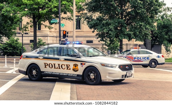 Washington D.C./ USA - 07.12.2013: Police cars on patrol\
on the street. 