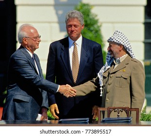 Washington, DC. USA, 13th September, 1993.
 Prime Minister Yitzhak Rabin Of Israel And Palestine Liberation Organization Chairman, Yasser Arafat, Shake Hands  After Signing The Peace Accords