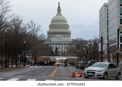 Washington, DC, USA - 16 January, 2021: Military and Police Vehicles blocking Streets around the US Capitol Building ahead of the Inauguration of Joe Biden as the 46th President of the United States