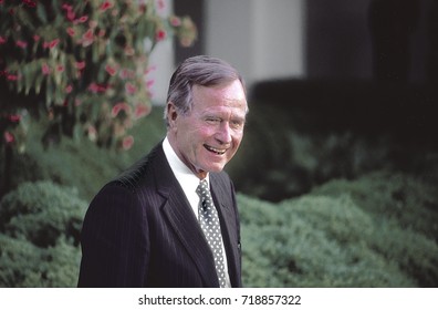 Washington, DC. USA, 1990
President George H.W. Bush Laughs While In The Rose Garden 