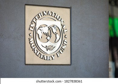 Washington, DC, USA - 2020 October 3: Sign of the International Monetary Fund at the Entrance of the IWF Headquarters Building