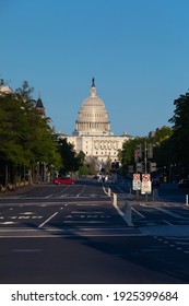 Washington, DC, USA - 27 April 2020: Capitol Building with empty Street during Covid-19 Lockdown in Evening Light
