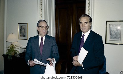 Washington DC. USA, 27th October, 1990
Senators George Mitchell And Robert Dole Look Over The Budget Bill Before Sending To The Full Senate For Approval. 
