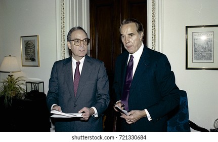 Washington DC. USA, 27th October, 1990
Senators George Mitchell And Robert Dole Look Over The Budget Bill Before Sending To The Full Senate For Approval. 
