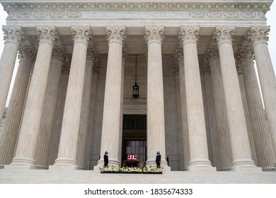 Washington, DC, USA / 9/24/2020: Justice Ruth Bader Ginsburg's Casket Draped In An American Flag On The Steps Of The Supreme Court.