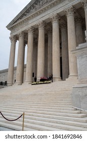 Washington, DC, USA / 9/24/2020: Justice Ruth Bader Ginsburg's Casket Draped In An American Flag On The Steps Of The Supreme Court.