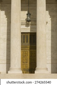 WASHINGTON, DC, USA - APRIL 06, 2015: United States Supreme Court Building Exterior And Bronze Front Doors.