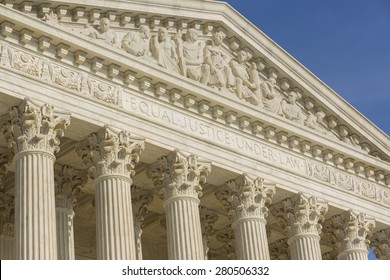 WASHINGTON, DC, USA - APRIL 06, 2015: United States Supreme Court Building Exterior. Equal Justice Under Law Phrase Engraved On Facade.