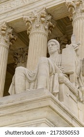 Washington, DC, USA - April 3, 2022: The Entrance To The Historic U.S. Supreme Court Building On Capitol Hill Is Flanked By Two Iconic Marble Figures Created By Renown Sculptor James Earl Fraser.