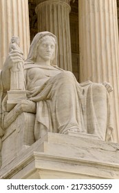 Washington, DC, USA - April 3, 2022: The Entrance To The Historic U.S. Supreme Court Building On Capitol Hill Is Flanked By Two Iconic Marble Figures Created By Renown Sculptor James Earl Fraser.