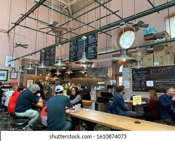 Washington, DC, USA - April 6 2019 - The Interior Of Eastern Market In Washington, DC, USA, People Having Lunch