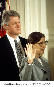 Washington DC, USA -AUGUST 10, 1993 
Ruth Bader Ginsburg Is Sworn In As Associate Justice Of The Supreme Court Of The United States. President William Clinton Stands Behind Her