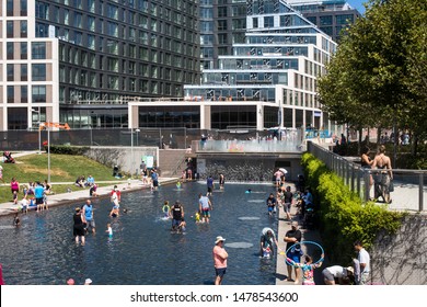 Washington, D.C. / USA - August 12, 2019: The Yards Park, Located In Navy Yard Along The Potomac River, Is A Popular Destination For Summertime Activities Among Local Residents. 