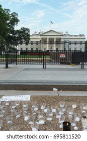 WASHINGTON, DC, USA - AUGUST 14, 2017: A Candlelight Memorial To Heather Heyer, And Against Neo-Nazis, Is In Front Of The White House.