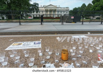 WASHINGTON, DC, USA - AUGUST 14, 2017: A Candlelight Memorial To Heather Heyer, And Against Neo-Nazis, Is In Front Of The White House.