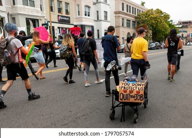 Washington, DC, USA - August 15, 2020: A Sign Adorns The Back Of The Supply Cart During The Defund The Police March Addressed To The Police: 