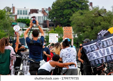 Washington, DC, USA - August 15, 2020: Two Signs Stand Out In A Brief Moment Of Disorganization On The Key Bridge During A Black Lives Matter Protest