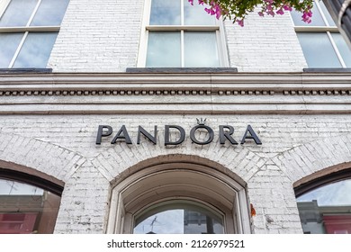 Washington DC, USA - August 18, 2021: Georgetown M Street Sign For Pandora Jewelry Store Shop Logo On Historic Brick Building With Nobody Exterior Facade