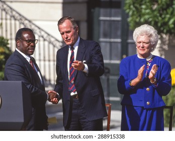 WASHINGTON, DC, USA - Clarence Thomas, Supreme Court nominee, swearing in ceremony at White House, with President and Barbara Bush. October 18, 1991