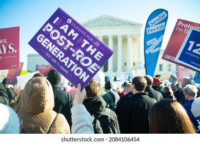 WASHINGTON, DC, USA – DECEMBER 1, 2021:  Protesters rally outside the Supreme Court as the court revisits Roe v. Wade and the issue of abortion rights in Washington, DC on December 1, 2021