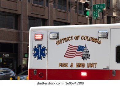 WASHINGTON, DC, USA - December 12, 2019: District Of Columbia Fire And EMS Logo On The Side Of Ambulance On-scene In Downtown Washington, D.C.