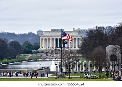WASHINGTON DC, USA - DECEMBER 27, 2015: Tourists visit the Lincoln memorial at the National Mall in Washington DC. The Lincoln Memorial is an American national monument built to honor Abraham Lincoln.