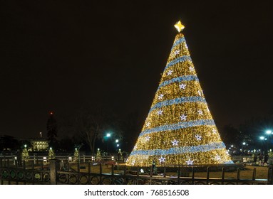 WASHINGTON, DC, USA - DECEMBER 4, 2017: The National Christmas Tree Is Lit Behind The White House.