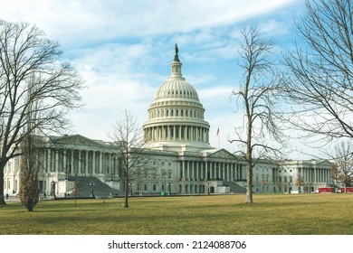 Washington, DC, USA - Feb 12th 2022: Capital Hill Exterior Horizontal View In Winter With Bare Trees 