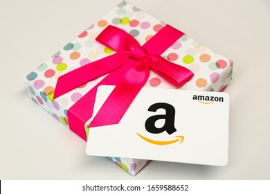 Washington, D.C. / USA - Feb. 26, 2020: An Amazon.com gift card is often gifted to people during special events, such as birthdays, baby showers, weddings and other important life events. 