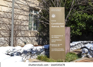 Washington D.C., USA - February 29, 2020: Sign Of United States Department Treasury And Internal Revenue Service (IRS) Outside Their Headquarters Building In Washington, D.C. USA.